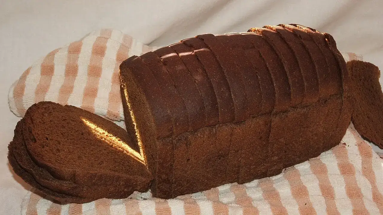 Dark rye loaf, sliced